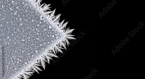 Fototapeta frosted icy texture with snowflakes formation isolated on black background