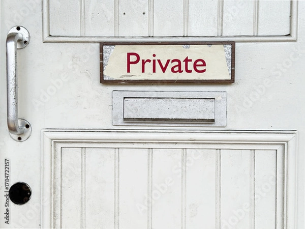 Fototapeta White door with private sign at rear of building