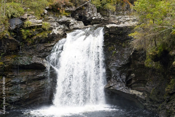 Fototapeta Falls of Falloch waterfall in Loch Lomond And Trossachs National Park, in Autumn in Stirling County on the West Highland, Scotland