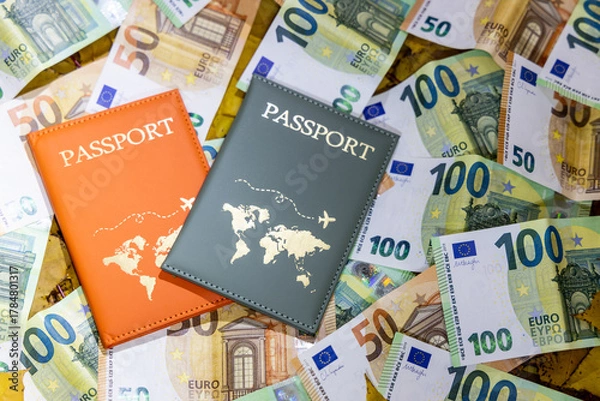 Fototapeta Passport and money Euro banknotes arranged together. Currency details and Europe travel document for tourism, finance, global travel expenses, international economy, cost worldwide journey concept