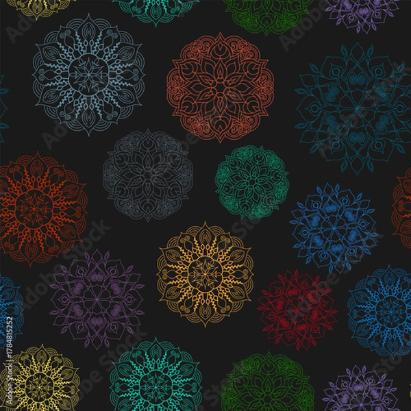 Obraz Seamless pattern of bright mandalas on a black background