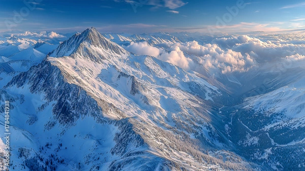 Obraz Majestic Snow-Covered Mountain Peaks and Clouds in Serene Blue S