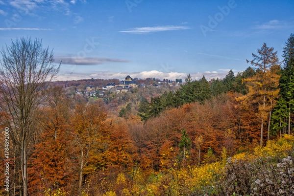 Obraz a beautiful hiking area in Solingen with a great view of the autumnal forest under blue skies