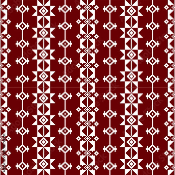 Fototapeta A vibrant red and white geometric pattern featuring various shapes arranged in a repeating design.