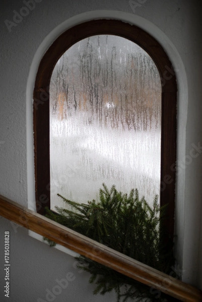 Fototapeta Fogged window. Beautiful window in a white wall.