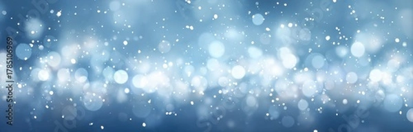Fototapeta Blue bokeh lights creating sparkling glitter background
