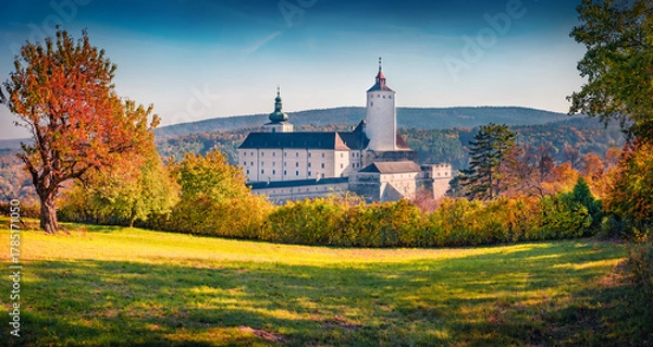 Obraz Panoramic view of Forchtenstein Castle, Austria, Europe. Attractive autumn scene of apple garden in outskirts of Forchtenstein town, district of Mattersburg in the Austrian state of Burgenland.