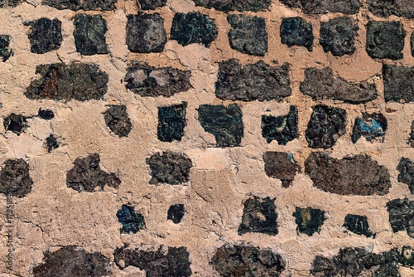 Fototapeta Old Axmar stone wall showing natural rock blocks texture