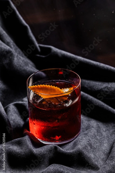 Obraz Red Negroni with black background. 