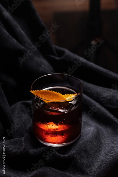 Obraz Red Negroni with black background. 