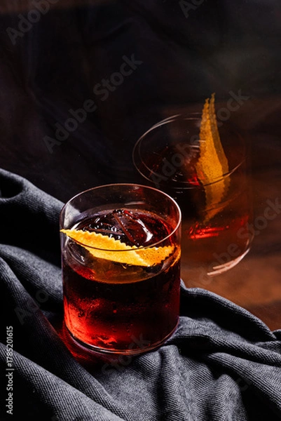 Obraz Red Negroni with black background. 