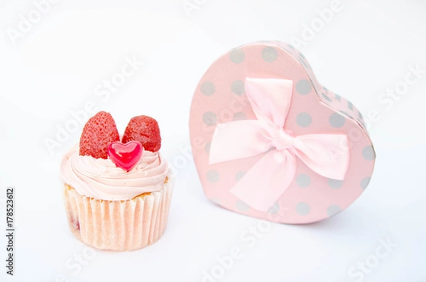 Obraz Delicious strawberry cupcakes with heart-shaped jelly are perfect for Valentine's Day backgrounds.