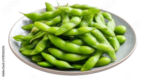 Fototapeta Fresh edamame pods on a plate, ready to eat  on white background.