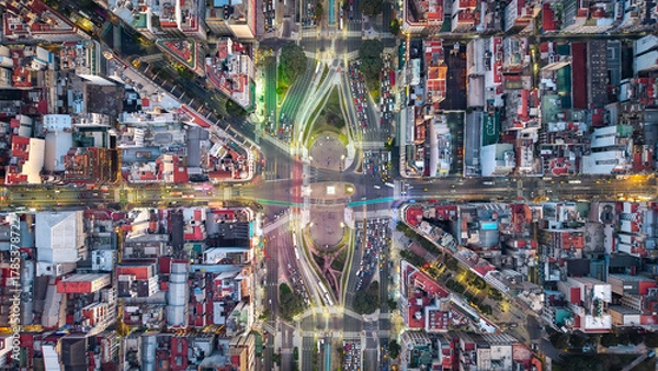 Obraz Aerial top-down view of Obelisco with traffic light trails at night, Buenos Aires, Argentina.
