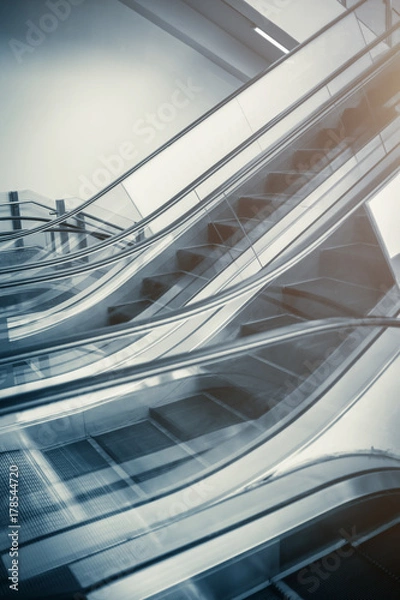 Fototapeta Close up to escalator yellow and gray steel line.