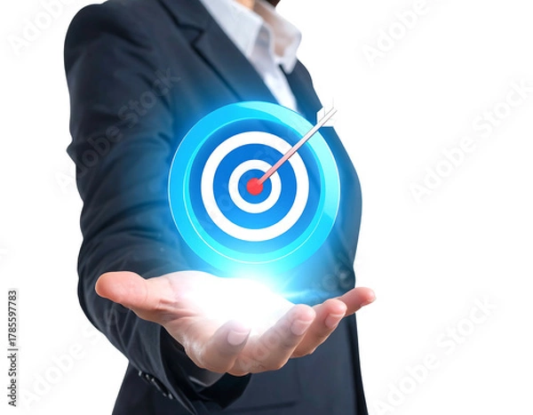 Obraz A person in a business suit presents a glowing, digital target with an arrow hitting the bullseye, representing goals