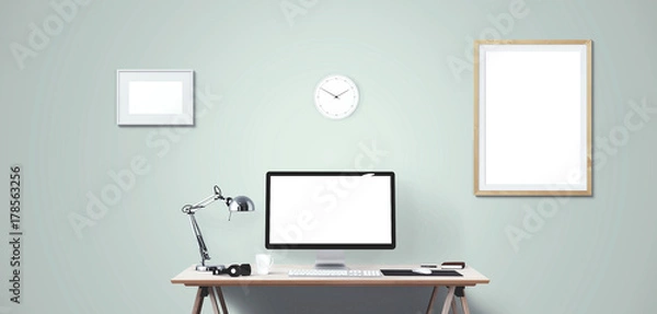 Fototapeta Computer display and office tools on desk. Desktop computer screen isolated. Modern creative workspace background. Front view.