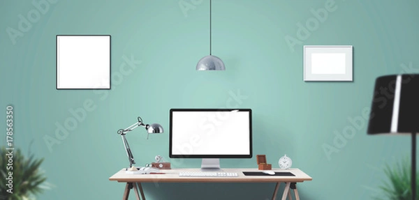 Fototapeta Computer display and office tools on desk. Desktop computer screen isolated. Modern creative workspace background. Front view.