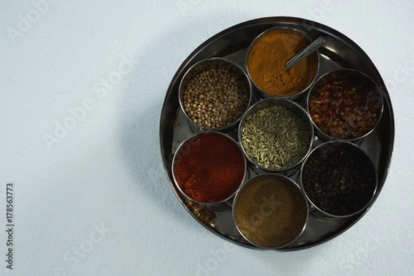 Fototapeta Typical spice box with multiple containers