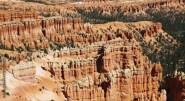 Fototapeta Aerial view showcases a rugged, eroded landscape with unique rock formations, showcasing nature's artistry