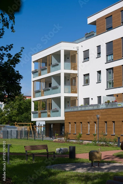 Obraz Modern apartment building with a landscaped inner courtyard