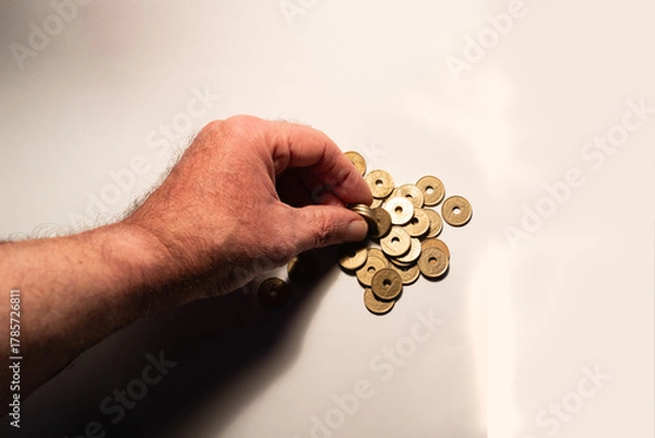 Fototapeta Hand counting japanese yen coins for financial planning