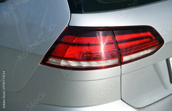 Fototapeta Detailed view of modern car tail light showcasing design elements