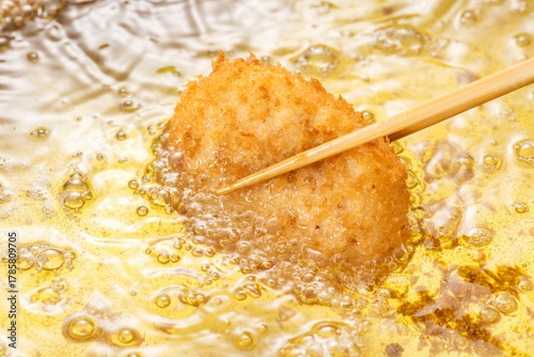 Obraz コロッケを揚げる