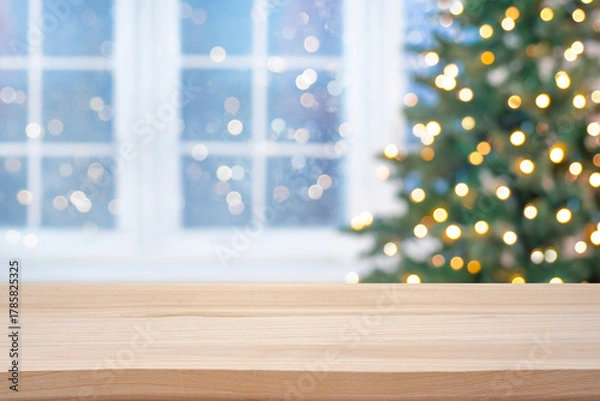 Fototapeta Wooden table top for product display on blurred Christmas fir tree lights and festive window interior background