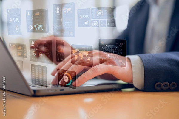 Fototapeta Businessman Manager using a laptop computer to review skills Human resource evaluation and performance appraisal. Employee talent assessment and competency assessment