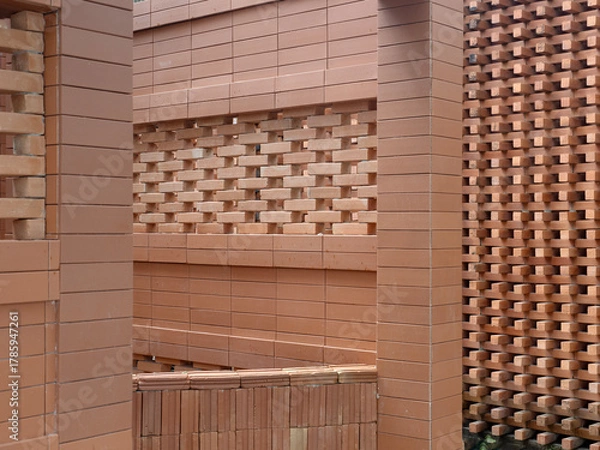 Fototapeta Red bricks for building in construction site for background.