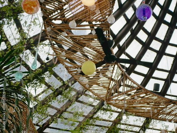 Fototapeta Cozy Indoor Lighting with Bamboo and Yellow Lamp Decor