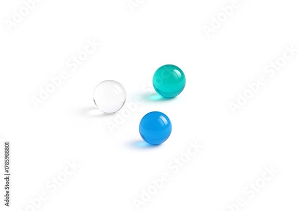 Obraz Minimalist composition featuring several glossy glass spheres  arranged on a pure white surface