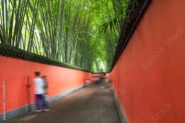 Fototapeta The red courtyard walls and alleys of traditional Chinese architecture