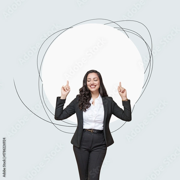 Fototapeta  Portrait of a smiling young business woman pointing up , isolated on free background with copy space.