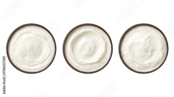 Fototapeta Yogurt kefir fromage blanc overhead three sets side by side on transparent background