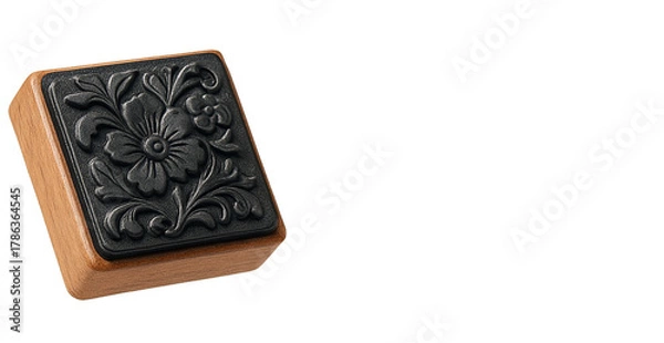 Fototapeta Elegant decorative stamp block featuring intricate black floral swirl pattern on wooden base, perfect for crafts, scrapbooking and handmade design projects, isolated on transparent background, PNG.