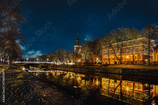 Fototapeta Night View of Aurajoki River with Turku Cathedral in Finland