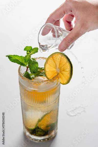 Fototapeta Spilled White Rum While Attempting to Pour into a Mojito