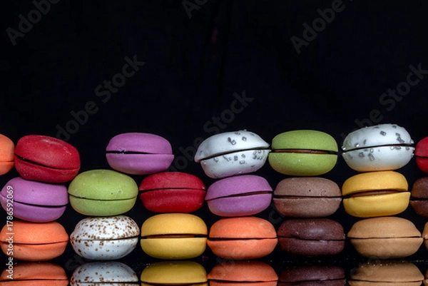 Fototapeta colorful macaroons on a wooden table