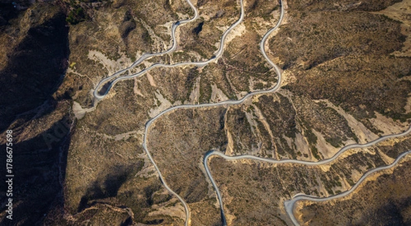 Obraz Caracoles de Villavicencio surrounded by dry hills and desert landscape in Mendoza, Argentina.
