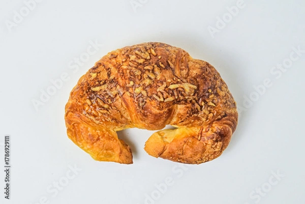 Fototapeta Top view of cheese croissant isolated on white background. Clipping path. Fresh, brown. close up, high angle, above, flat lay. 