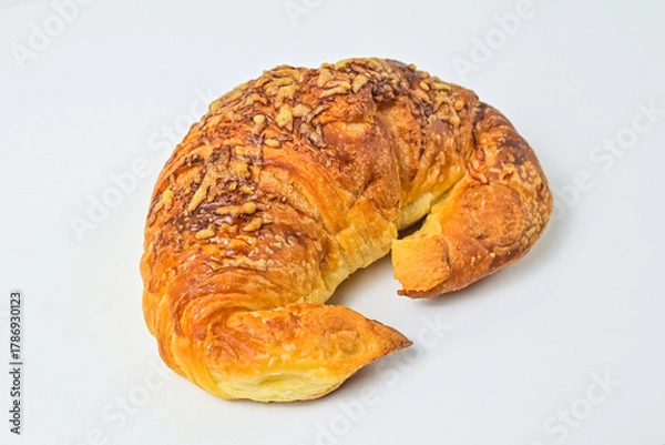 Fototapeta Close up view of cheese croissant isolated on white background. Clipping path. Fresh, brown. 