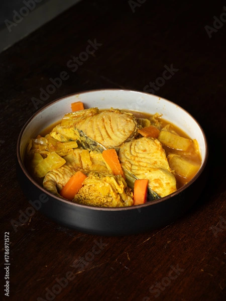 Obraz Thai spicy sour curry with king mackerel fish