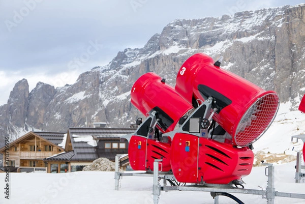 Fototapeta Front view of two snow cannons in alpine ski resort