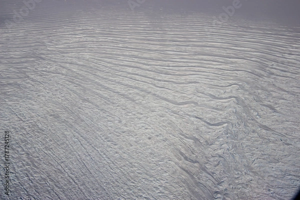 Fototapeta Aerial view of wind blown ice dunes and texture - Antarctica