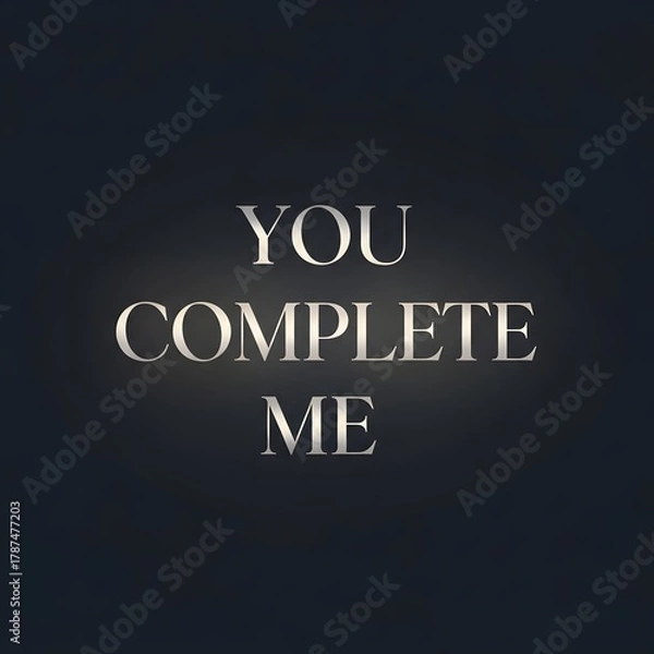 Fototapeta A minimalistic and elegant graphic design featuring the phrase 'You Complete Me' in stylish metallic letters on a dark background, conveying love and connection