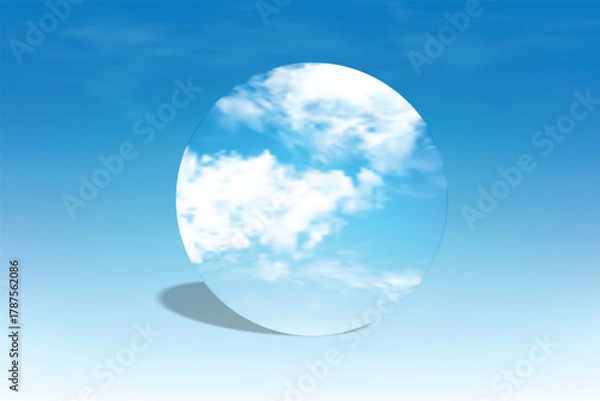 Obraz Minimal round mirror reflecting bright blue sky and clouds on blue background. Clean and modern composition ideal for product mockup, cosmetic display, branding, and design presentation.