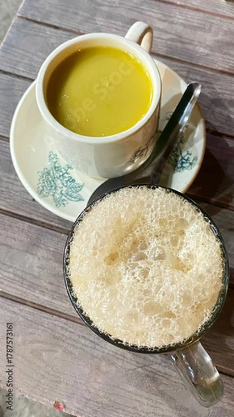 Obraz Photo of coffee and tea on a wooden table