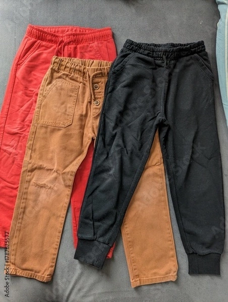 Fototapeta Colorful and comfortable roomy pants for an active two-year-old toddler, perfect for playtime.

